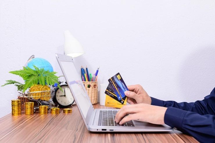 low angle view of man using laptop on table
